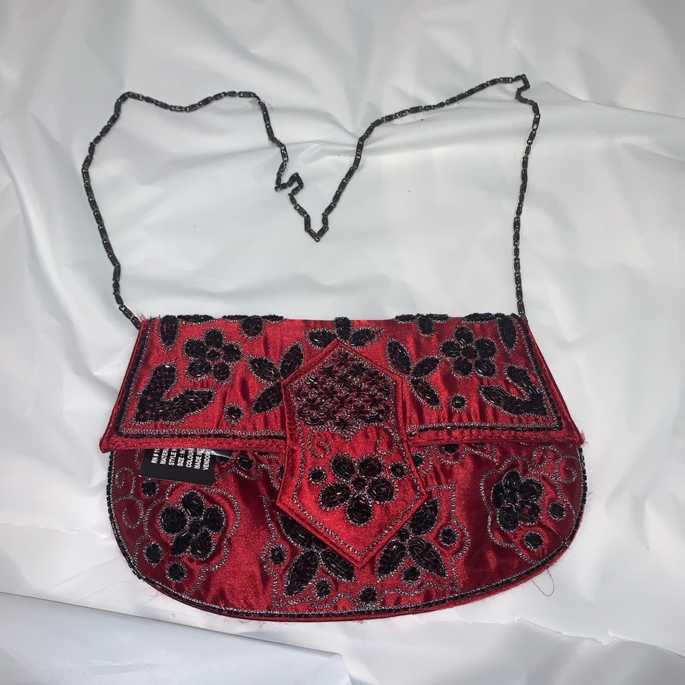 NWT Cami international beaded clutch